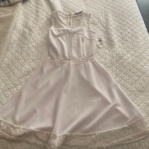 NWT! White lace dress. Size M. Charlotte Russe. No stains.